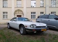 Old classic vintage ebony white Jaguar XJ-S or XJS 12V convertible parked