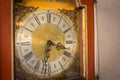 Old vintage or classic clock face with wood frame on wall. Royalty Free Stock Photo