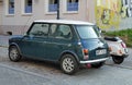 Old vintage classic dark green Morris Mini Cooper parked Royalty Free Stock Photo