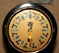 Old vintage clock with roman numerals on the dial. Royalty Free Stock Photo