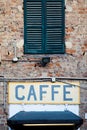 Old vintage coffee sign in Italy - Concept of retro, traditional CaffÃ¨ design