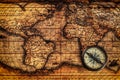 Old vintage compass on ancient map Royalty Free Stock Photo