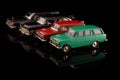 Old vintage die cast car model collection isolated on the black background Royalty Free Stock Photo