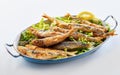 Old vintage dish with fried sardines in batter