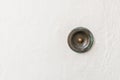 Old vintage door bell with stone background Royalty Free Stock Photo