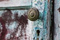 Old vintage door handles. Rusty metal locks and latches.