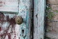 Old vintage door handles. Rusty metal locks and latches.