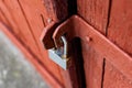 Old vintage door handles. Rusty metal locks and latches. Protective devices for wooden yard Royalty Free Stock Photo