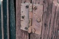 Old vintage door handles. Rusty metal locks and latches. Protective devices for wooden yard Royalty Free Stock Photo