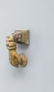 Old vintage door knocker shaped like a hand Royalty Free Stock Photo