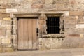 Old vintage door of stone building in Scotland Royalty Free Stock Photo