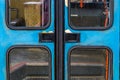 Old vintage doors of a school bus, retro entrance of a old vehicle, nostalgic background Royalty Free Stock Photo