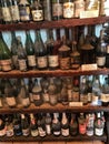 old vintage dusty wine bottles in the wine cabinet