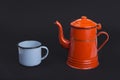 Old vintage enamel teapot and cup Royalty Free Stock Photo