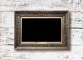 Old vintage gold ornate frame for picture on wall Royalty Free Stock Photo