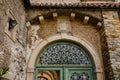 Old vintage green wooden front door, arches, lattice gates, architectural decoration of buildings, Baroque romantic castle Nove