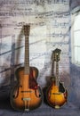 Old Vintage Guitar and Mandolin with Musical Notes Royalty Free Stock Photo