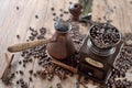 old vintage hand grinder with Coffee beans and spices on wooden table Royalty Free Stock Photo