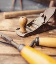 Old vintage hand tools on wooden background. Royalty Free Stock Photo