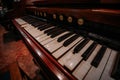 Old vintage harmonium piano keyboard. Close up view