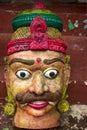 Old vintage head of statue in wood from Rajasthan in India