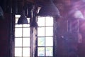 Old vintage Industrial interior with bright light coming through windows. Beautiful sunlight Royalty Free Stock Photo