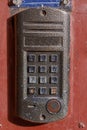 Old vintage intercom doorbell on apartment building doors