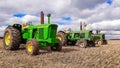 3 old vintage john deere tractors Royalty Free Stock Photo