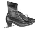 Vintage black leather boots on a white background Royalty Free Stock Photo