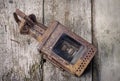 Old vintage lamp on grunge wooden table