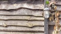 Old vintage lamp on wooden fence