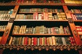 Old vintage library bookshelves, books on the shelves