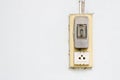 Old vintage light switch and electric plug socket. Royalty Free Stock Photo