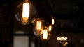 Old Vintage Lighting In The Dark Room. Clip. Vintage light bulb. Decorative antique edison style light tungsten bulbs