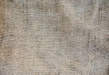 Old vintage linen cloth textile. Burlap rustic tumbled texture background Royalty Free Stock Photo