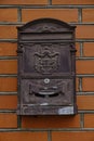 Old vintage mailbox on brick wall. Royalty Free Stock Photo