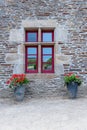 Old and vintage mansion residence stone wall and red color window Royalty Free Stock Photo