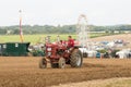 Vintage McCormick International Tractor ploughing