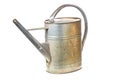 Old vintage metal watering can isolated on white background. Royalty Free Stock Photo