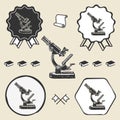 Old vintage microscope symbol emblem label Royalty Free Stock Photo