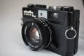 old vintage Minolta Hi-Matic 7s II photo film camera and lens