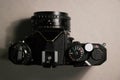 old vintage Nikon photo film camera and lens Royalty Free Stock Photo