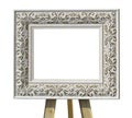 Old vintage ornate white picture frame on a stand with pattern i Royalty Free Stock Photo