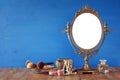 Old vintage oval mirror and woman toilet fashion objects Royalty Free Stock Photo