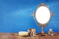 Old vintage oval mirror and woman toilet fashion objects Royalty Free Stock Photo