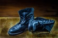 Old vintage pair of worn black shoes. Royalty Free Stock Photo