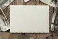Old vintage photo template mockup on wooden background. Empty retro card, textured paper Royalty Free Stock Photo