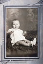 Old Vintage Photo of Young Baby Girl Portrait Royalty Free Stock Photo