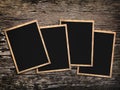 Old vintage photos on a wooden background Royalty Free Stock Photo