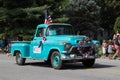 Old vintage truck with flag. Royalty Free Stock Photo